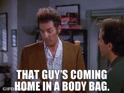 Man In Suit Says That Guy's Coming Home In A Body Bag GIF