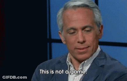 Man In Suit Says This Is Not A Game GIF