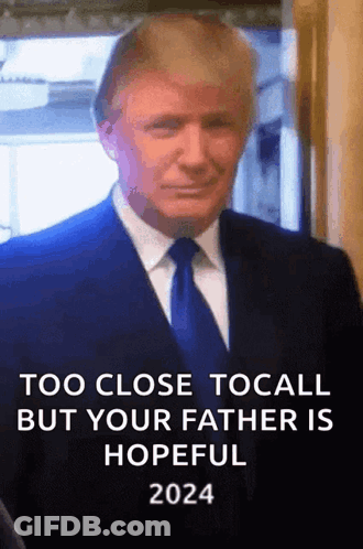 Man In Suit Says Too Close To Call But Your Father Is Hopeful GIF