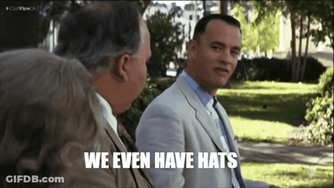 Man In Suit Says We Even Have Hats GIF