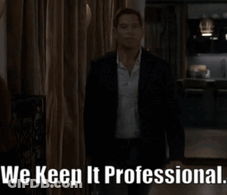 Man In Suit Says We Keep It Professional In Dark Room GIF