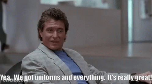 Man In Suit Says Yea We Got Uniforms GIF