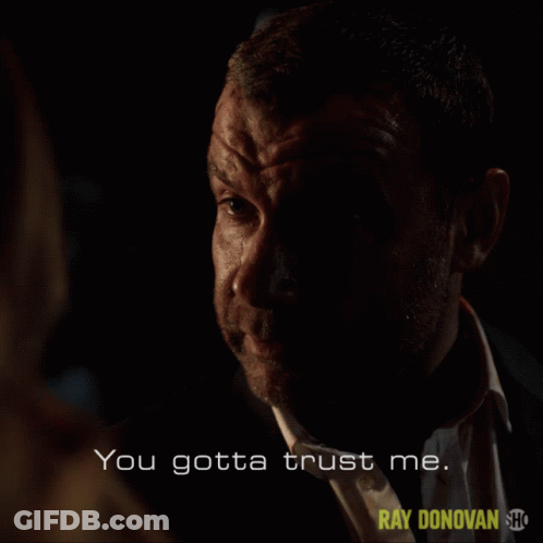 Man In Suit Says You Gotta Trust Me In Dark Room GIF