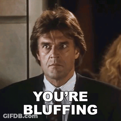 Man In Suit Says You're Bluffing GIF