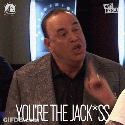 Man In Suit Says You're The Jack*ss While Pointing GIF