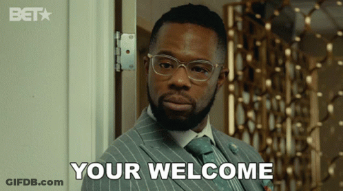Man In Suit Says You're Welcome GIF