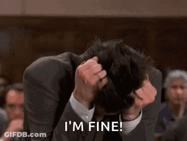 Man In Suit Scratching Head Saying I'm Fine GIF