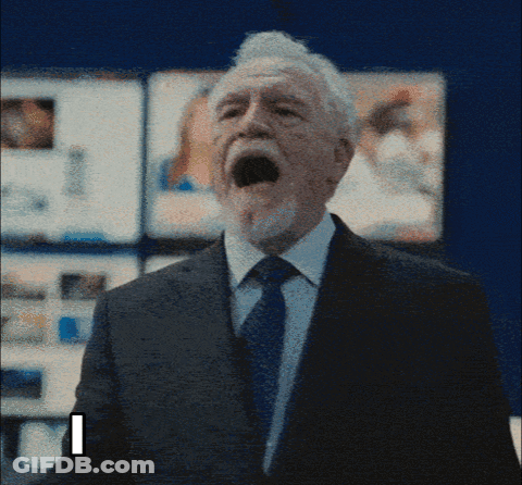 Man In Suit Screaming With Letter I GIF
