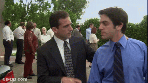 Man In Suit Shaking Hands With Another Man GIF