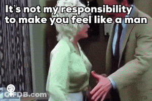 Man In Suit Shaking Hands With Woman In Green Top GIF