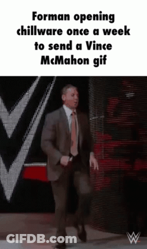 Man In Suit Signing Autographs For Fans GIF