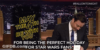 Man In Suit Signing May The 4Th Card GIF