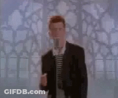 Man In Suit Singing Into Microphone GIF