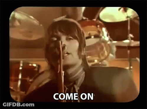 Man In Suit Singing Into Microphone Come On GIF