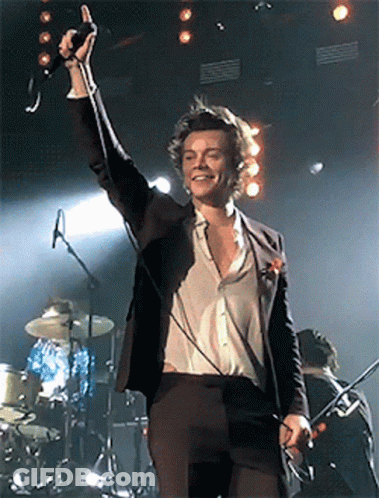 Man In Suit Singing Into Microphone GIF