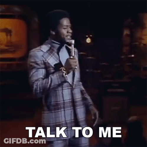 Man In Suit Singing Into Microphone GIF