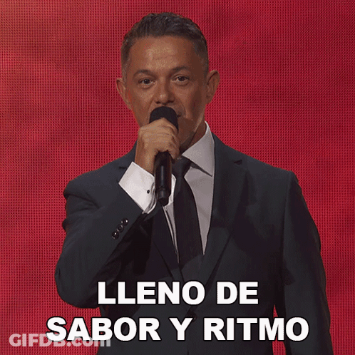 Man In Suit Singing Lleno De Sabor Y Ritmo GIF