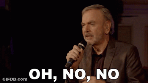 Man In Suit Singing Oh No No Into Microphone GIF