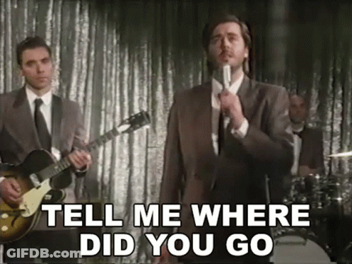 Man In Suit Singing Tell Me Where Did You Go GIF