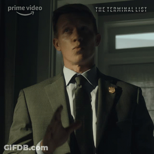 Man In Suit Sitting At Computer GIF