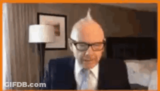 Man In Suit Sitting At Computer GIF