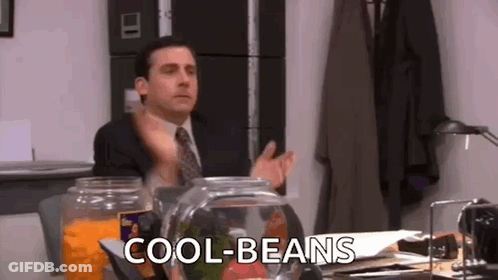 Man In Suit Sitting At Desk GIF