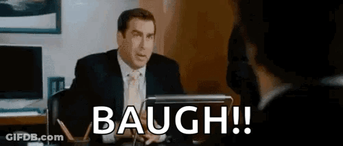 Man In Suit Sitting At Desk Talking To Another Man GIF