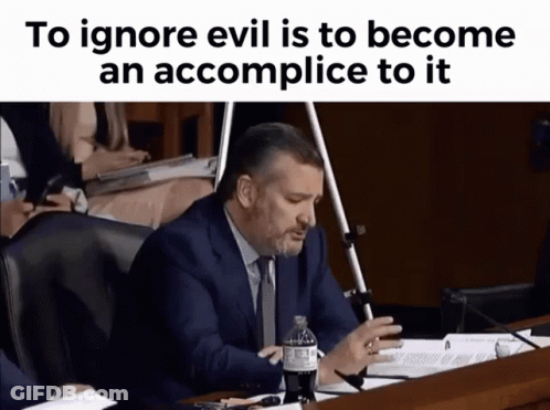 Man In Suit Sitting At Desk With Coca Cola Bottle GIF