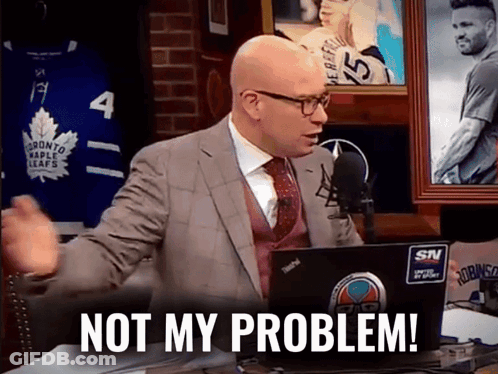 Man In Suit Sitting At Laptop Saying Not My Problem GIF