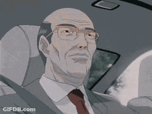 Man In Suit Sitting In Back Seat GIF