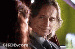Man In Suit Sitting In Back Seat Of Car GIF