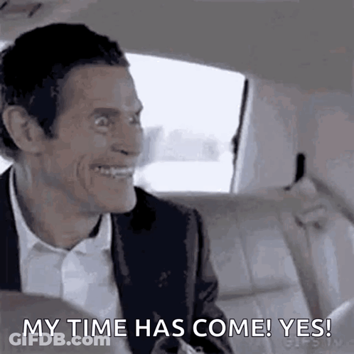 Man In Suit Sitting In Back Seat Of Car GIF