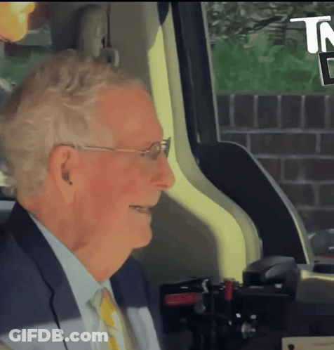 Man In Suit Sitting In Car GIF