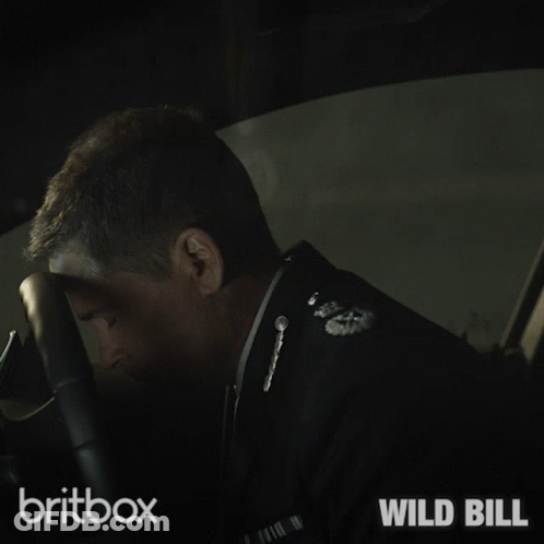 Man In Suit Sitting In Car Britbox Wild Bill GIF