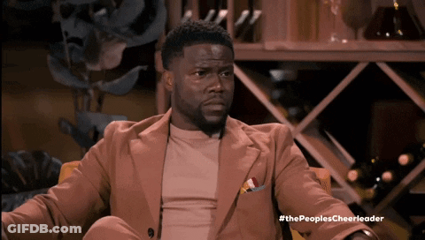 Man In Suit Sitting In Chair GIF