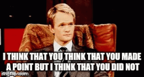 Man In Suit Sitting In Chair Saying I Think GIF