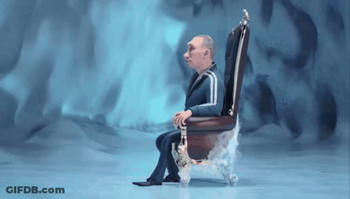 Man In Suit Sitting In Chair With Smoke GIF