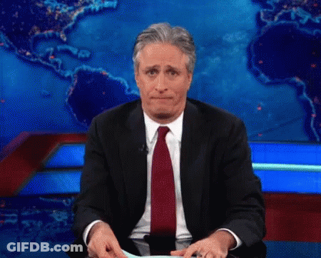 Man In Suit Sitting In Front Of Map GIF