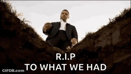 Man In Suit Sitting In Grave R.I.P GIF