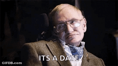 Man In Suit Sitting In Wheelchair GIF