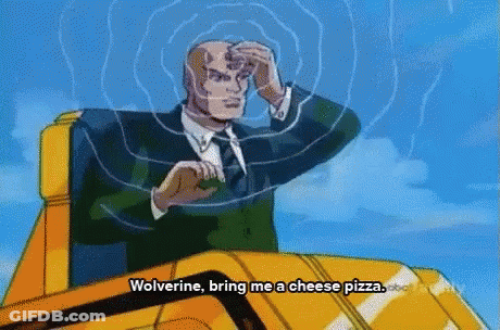 Man In Suit Sitting On Yellow Vehicle GIF