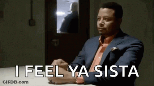 Man In Suit Sitting With Arms Crossed Saying I Feel Ya Sista GIF