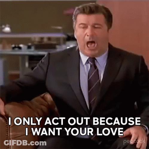 Man In Suit Sitting With Mouth Open GIF