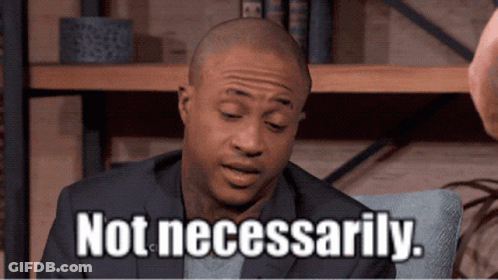 Man In Suit Sitting With Not Necessarily GIF
