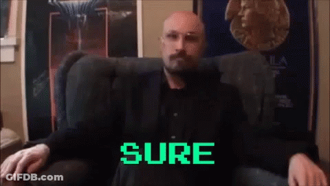 Man In Suit Sitting With Sure GIF