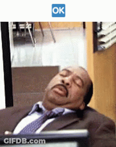 Man In Suit Sleeping At Computer With Ok GIF
