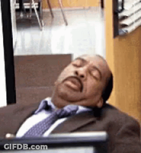Man In Suit Sleeping At Desk GIF