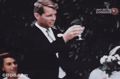 Man In Suit Smiling GIF