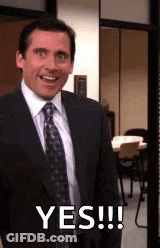 Man In Suit Smiling And Saying Yes GIF