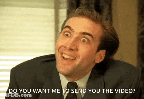 Man In Suit Smiling Asking Send Video GIF